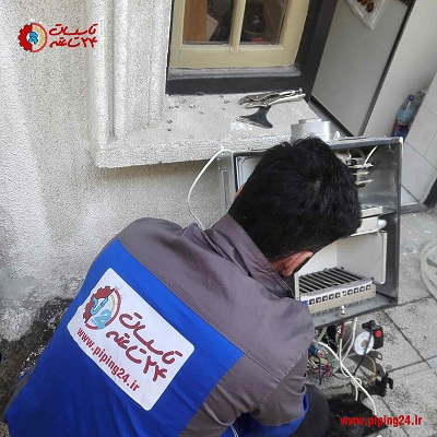 مجری تاسیسات 24 ساعته تهران در حال تعمیر پکیج